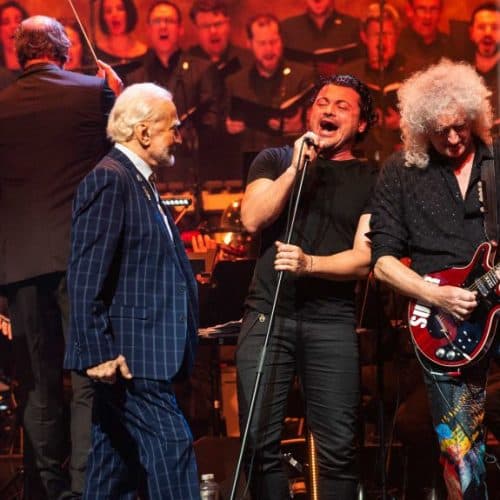 Watch Brian May perform Queen’s We Are The Champions for Buzz Aldrin